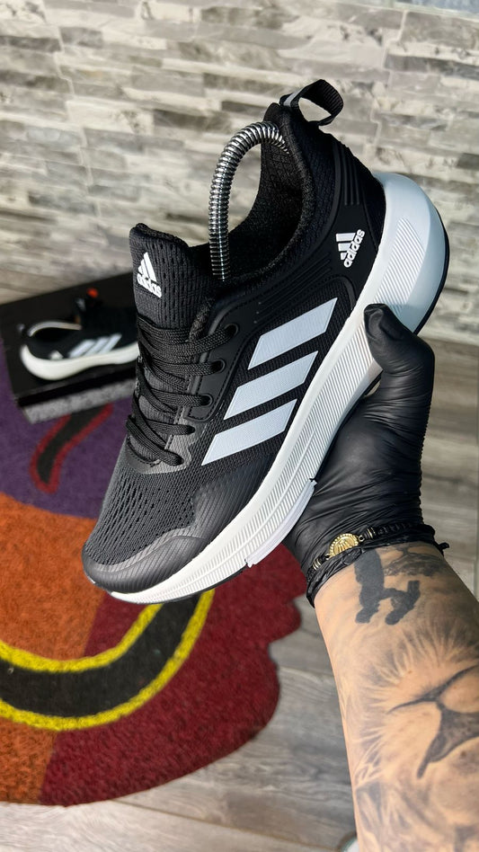 Adidas Vounce Negra Damas y Caballeros
